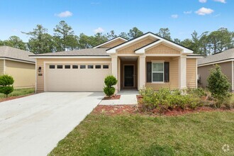 Building Photo - 4 Bedroom Close to shopping and schools