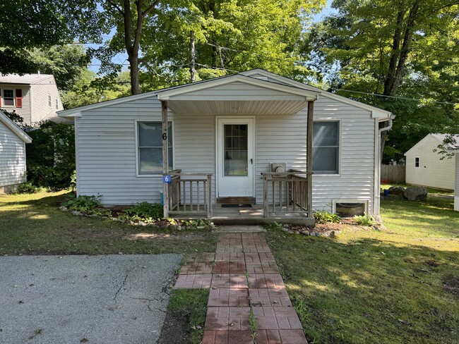 Covered front porch with view of the lake - 9R Lake Dr