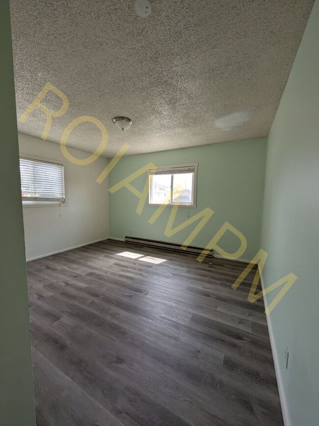 Building Photo - 112 8th Ave S