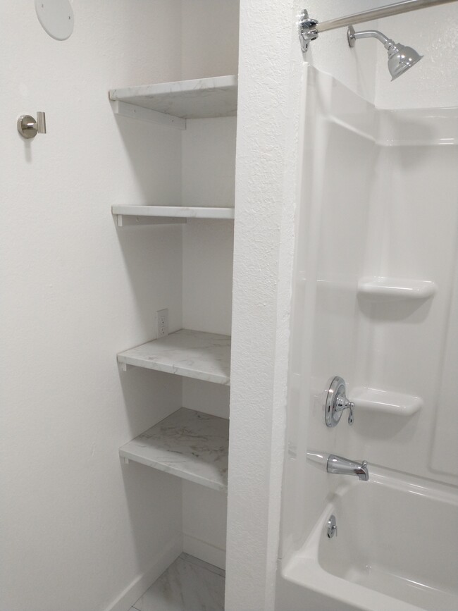 Bathroom has lots of storage - 306 S. 2nd. St.