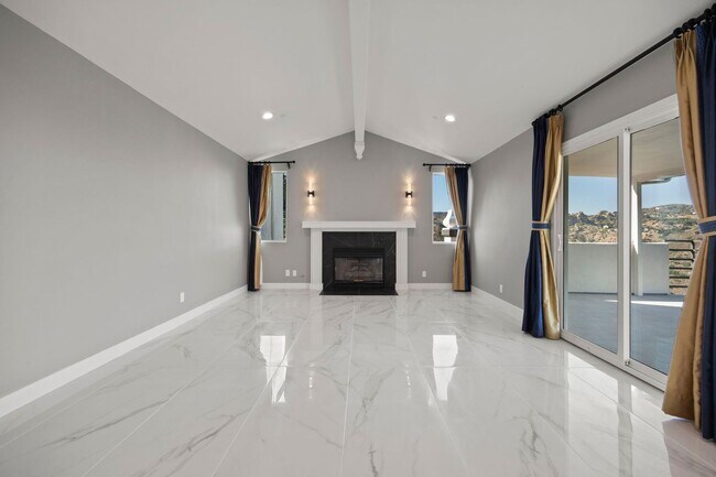 Building Photo - Modern Elegance Meets Scenic Privacy in Be...