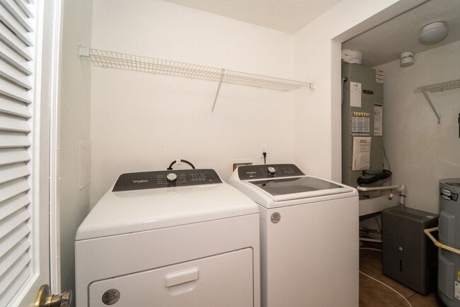 Building Photo - Belle Haven 2-Bedroom Condo with Pond View and Garage