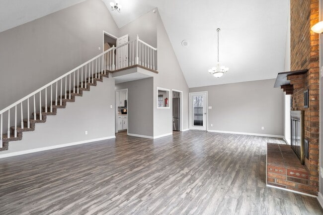 Building Photo - Lovely home on beautiful wooded corner lot