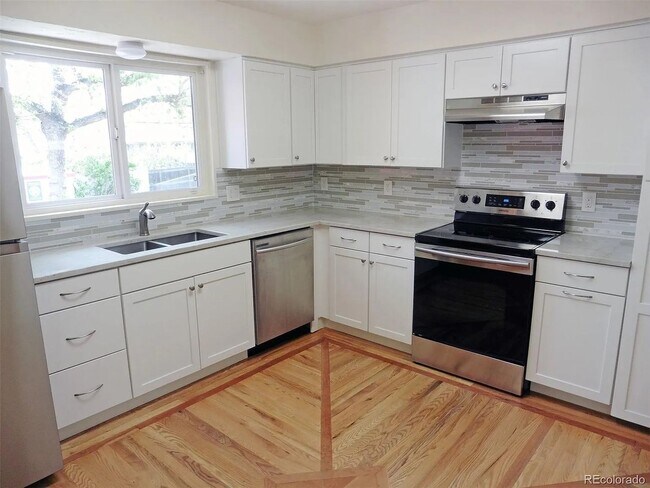 Building Photo - Spacious Littleton Home with Large Fenced Yard & Attached Garage!