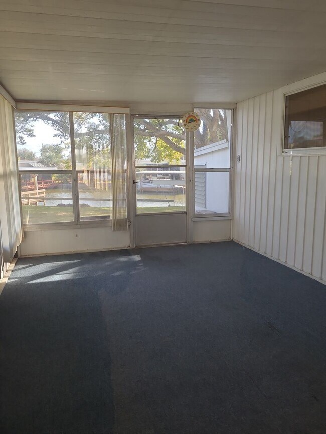 Building Photo - 55+ mobile home community. On canal to bea...
