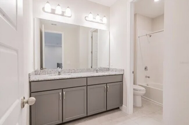 Building Photo - Stunning 5-Bedroom Executive Home with Lak...