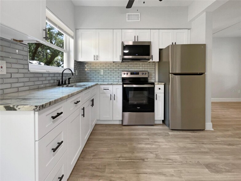 Building Photo - 10512 51st Terrace N