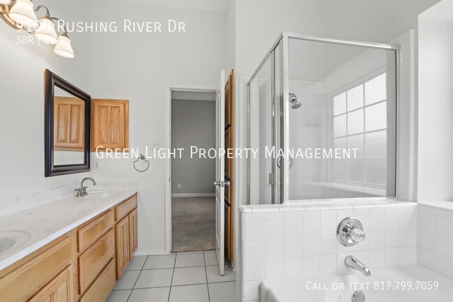 Building Photo - 9100 Rushing River Dr