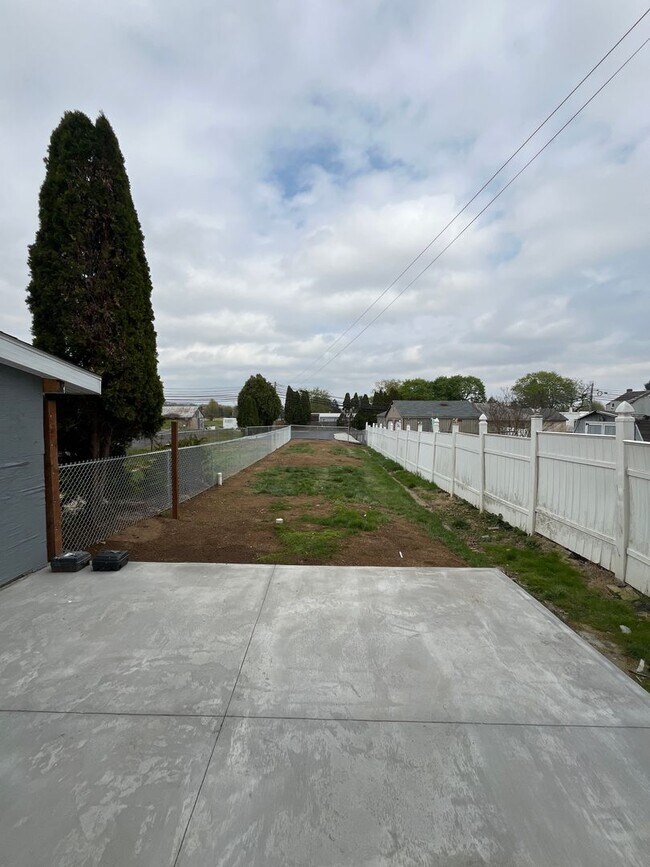 Building Photo - A real stunner! The full renovation is the first thing you'll notice..