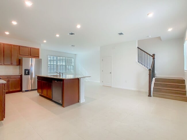 Building Photo - New Luxury Townhome in Celebration, FL Corner unit.  All porcelain tiled floors.  Aleutian model ...