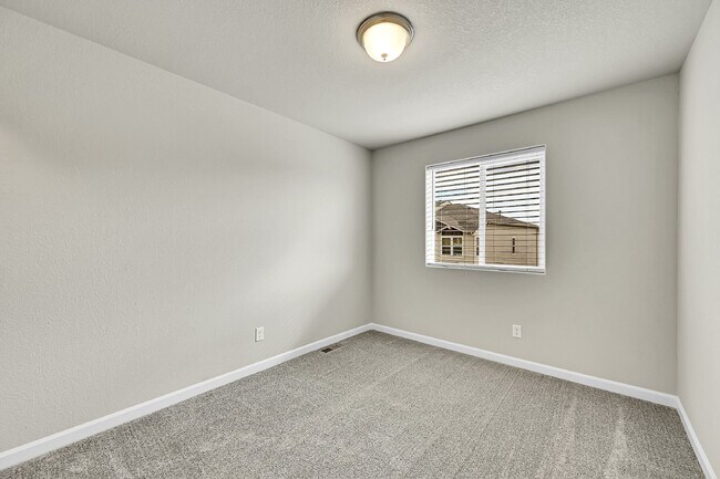 Building Photo - $2,040.95 -  3 bed, 2.5 bath Townhome in CO Springs with Central AC!