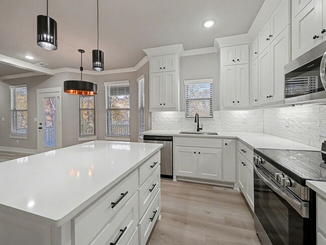 Building Photo - Tucked Into A Prime Spot In Bella Vista Wi...