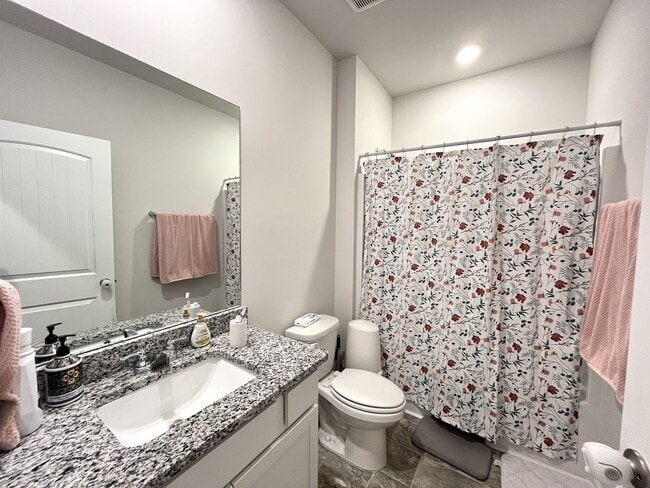 Building Photo - 4-Bedroom w/ Open Layout & Community Perks