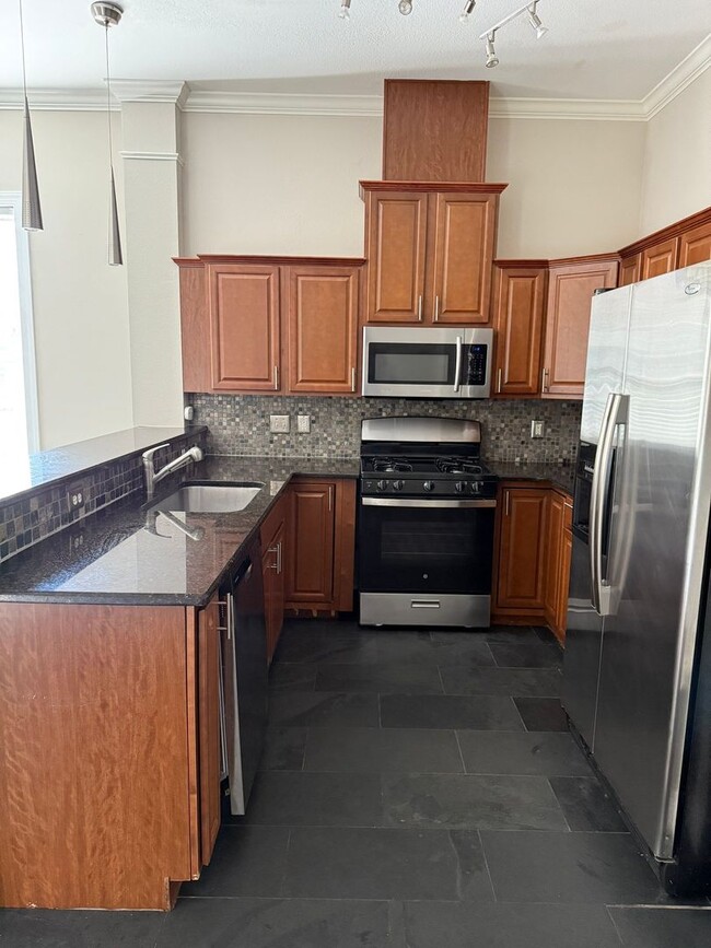 Building Photo - 3 Bedroom Townhome in All Saints District!...