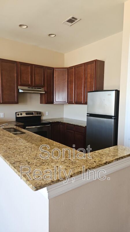 Building Photo - 6087 Wilton Dr