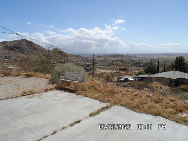 Building Photo - 2 Bedrooms, 1.5 Bathrooms, 2 Car Garage, 973 sq. ft., View of Victor Valley, Storage Shed