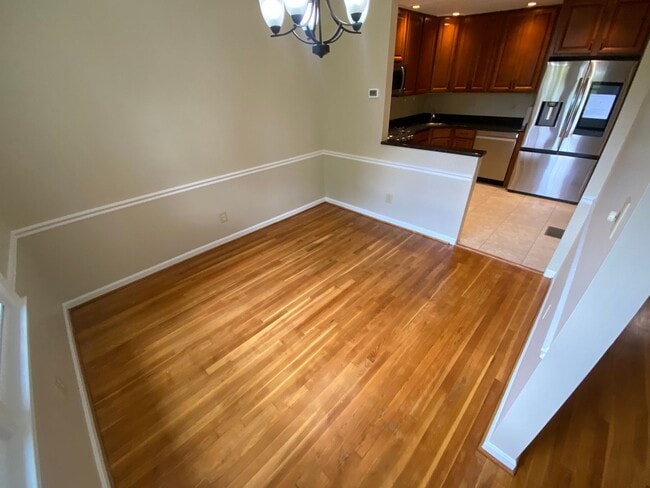 Building Photo - A fully updated Four Bedroom, Three and On...