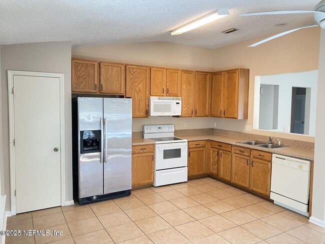 Building Photo - 5646 Chirping Way W