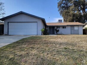 Building Photo - Welcome to this charming 3-bedroom