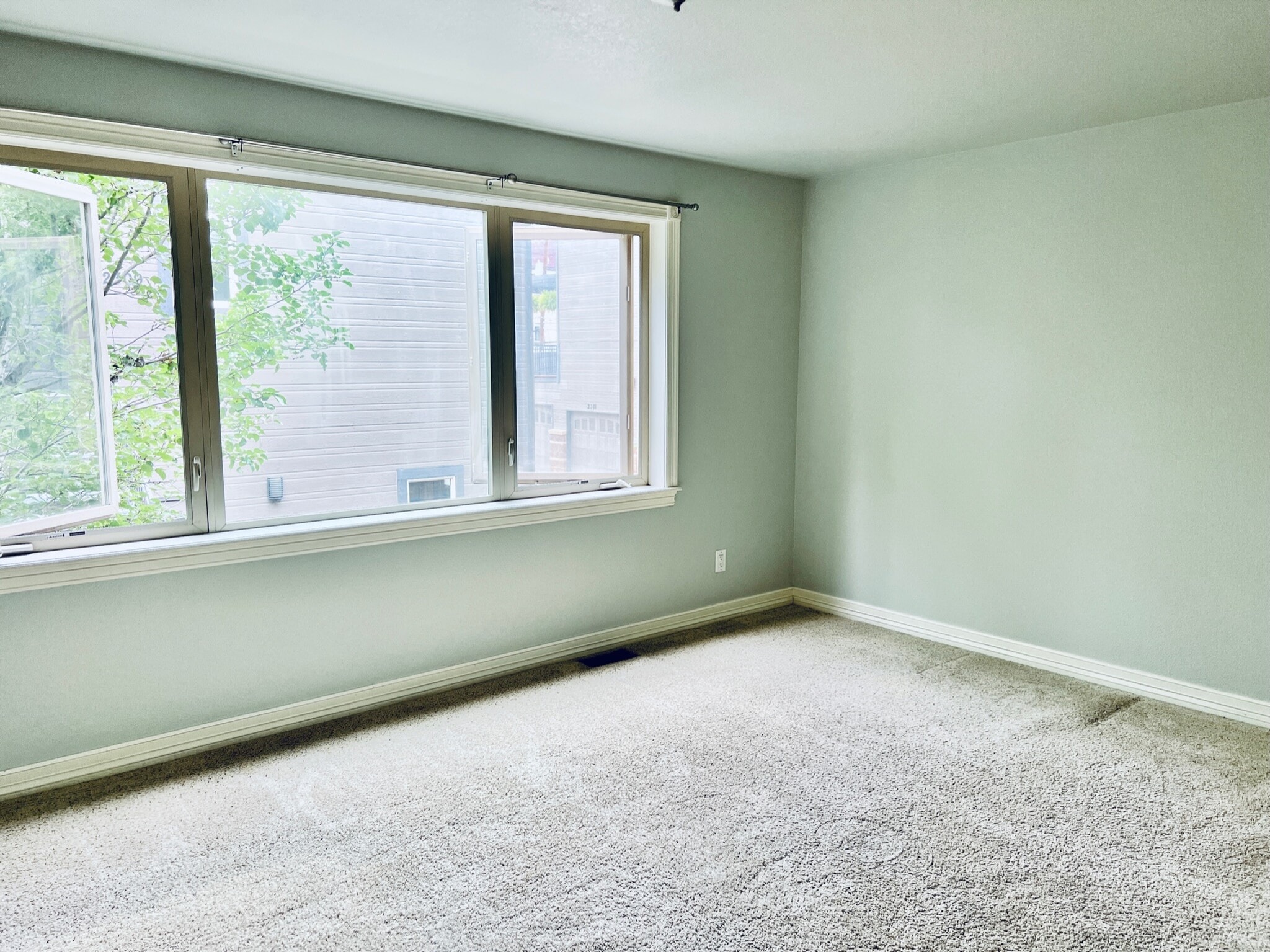 Large master bedroom with lots of natural light. - 2317 Decatur St