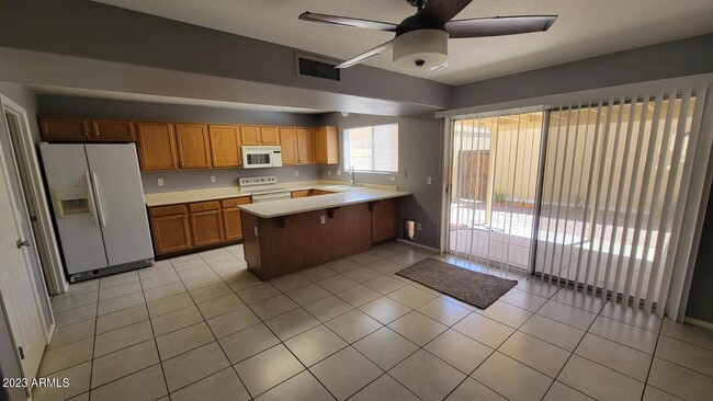Building Photo - 5846 W Gelding Dr