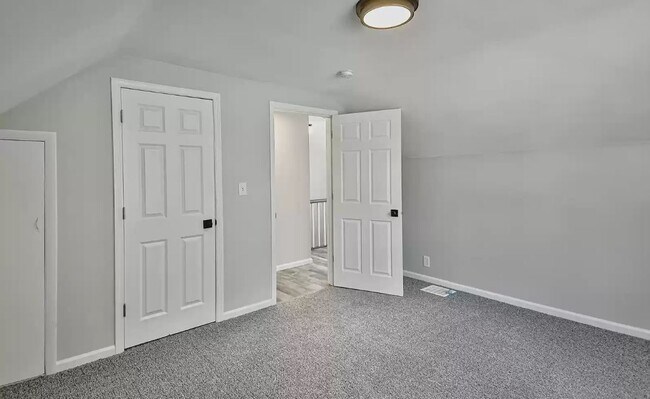 Upper bedroom with new doors and hardware - 743 Marie Ave