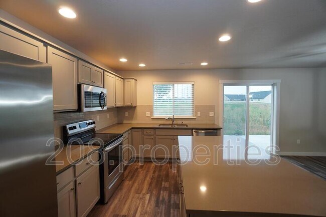 Building Photo - 13776 S Piano Ave