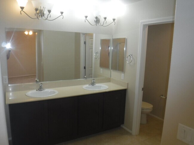 Building Photo - SPACIOUS 4 BEDROOM HOME WITH 2.5 BATHS, 2 ...
