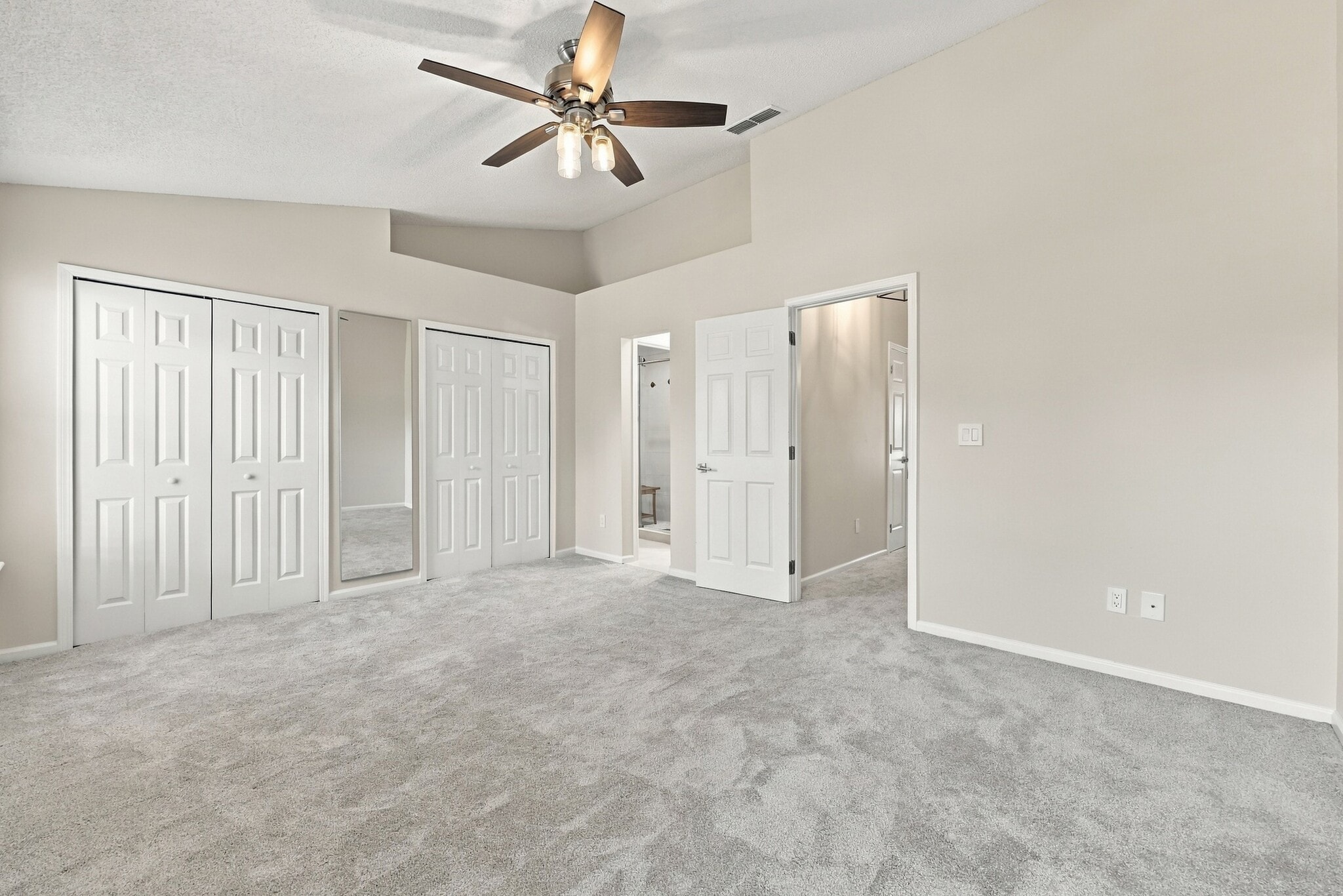 Generously sized primary suite with room for a full bedroom setup. - 3622 Caroline Vale Blvd