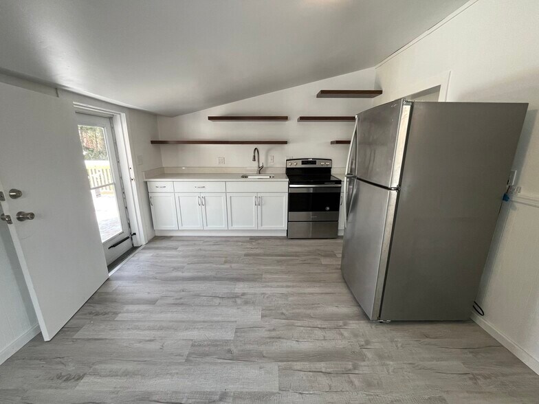 Kitchen with stainless steel appliances - 335 1st St