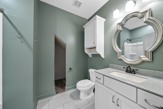 Building Photo - Elegant 4-Bedroom Home with Vaulted Ceilin...