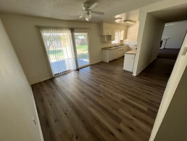 Building Photo - 4 bedroom 2 bath,  fenced yard w/ fruit tr...