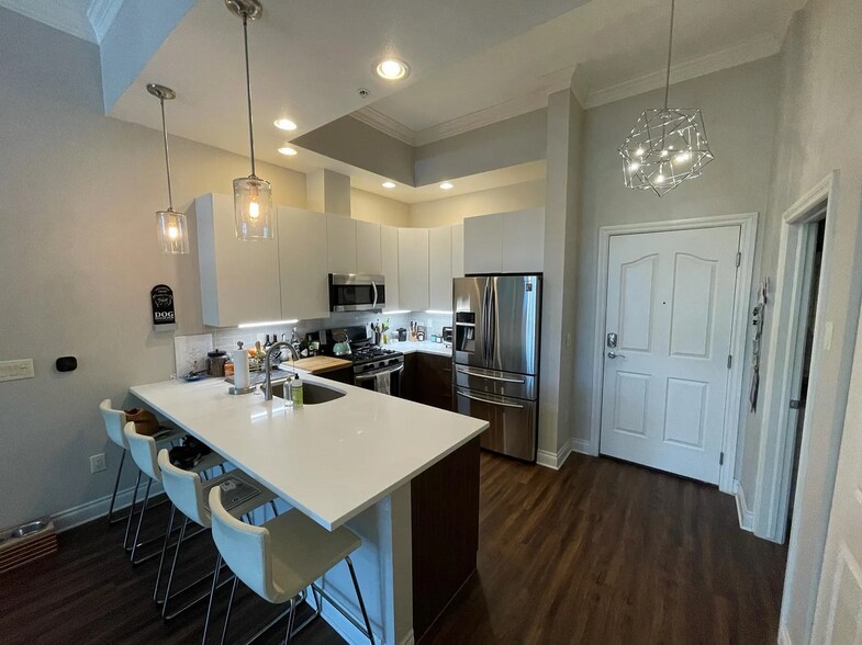 Unit entrance, LED and Edison Bulb fixtures - 1700 N Emerson St