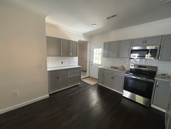 Building Photo - 1430-1413 13th Pl S