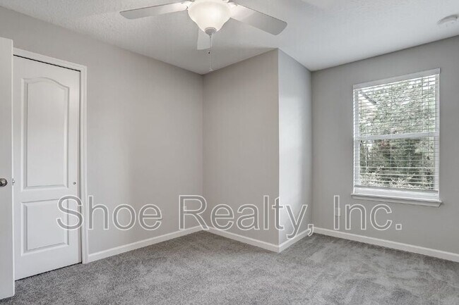 Building Photo - 4220 Plantation Oaks Blvd