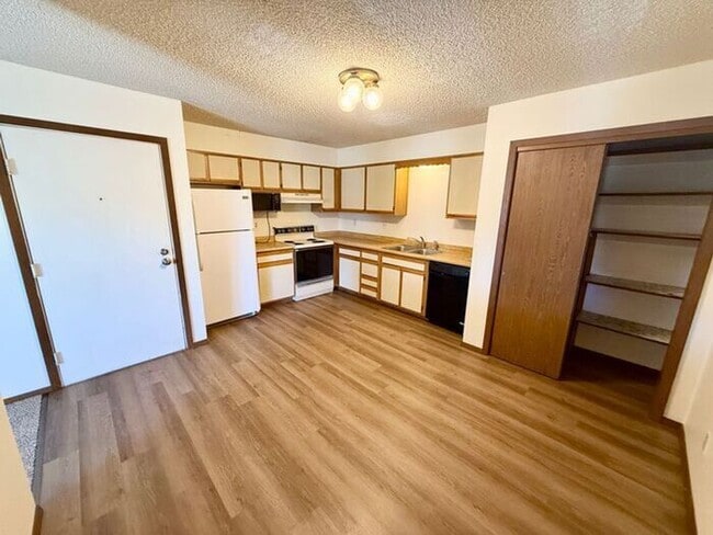 Building Photo - Limited-Time Move-In Deal: Get Your First 2 Weeks FREE! Spacious 2 Bed, 1 Bath Apartments + Water...