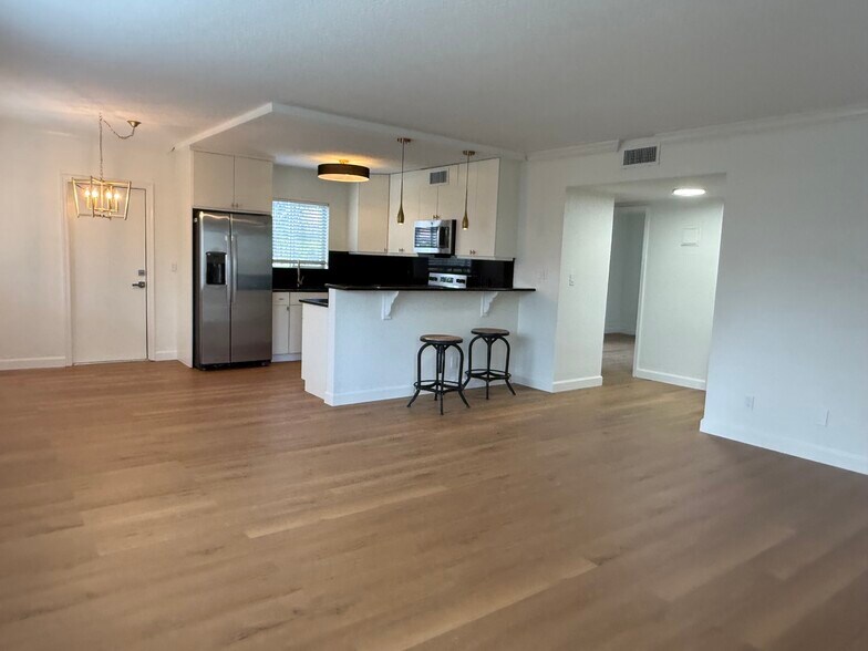 Brand New Luxury flooring throughout the entire unit. - 1353 Holly Heights Dr