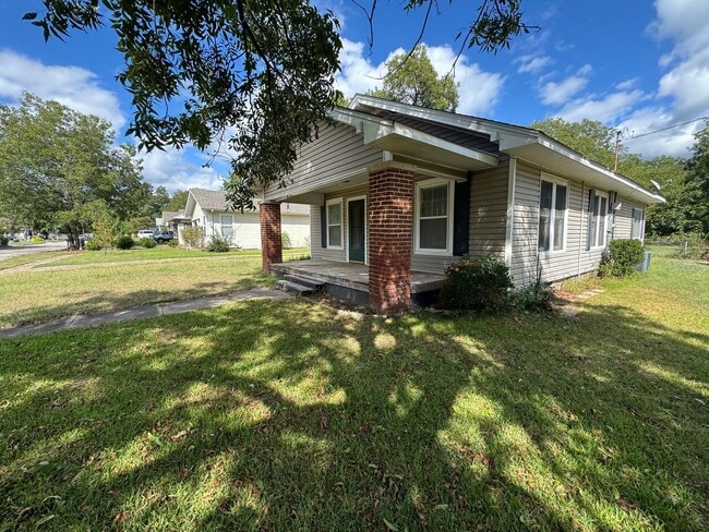 Primary Photo - Three bedroom two bath home with central heat and air, large fenced backyard, and carport!