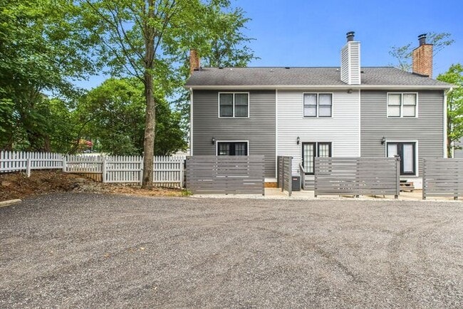 Building Photo - UNCG Area – Chancellors Court Townhomes. Walk to Campus and just minutes to Downtown!