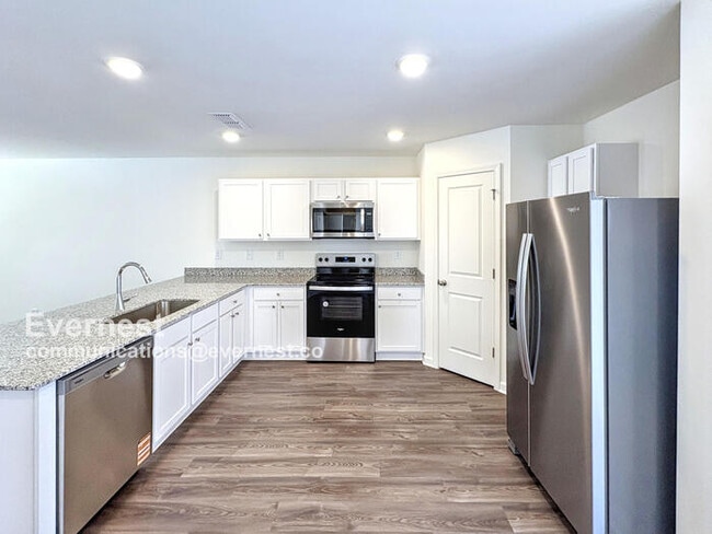 Building Photo - 4 Bed, 3 Bath Home with Garage / Pet-Friendly / Coming Soon!