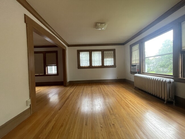 The view of the living room from the front entrance. - 4235 Pleasant Ave