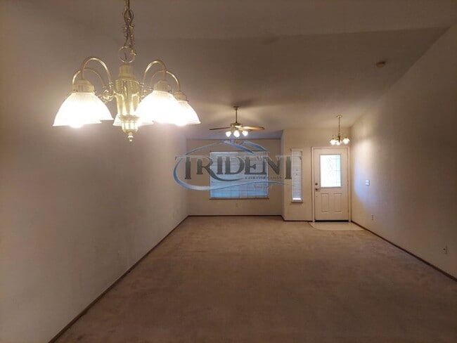 Building Photo - Small pet friendly duplex with front yard landscaping included