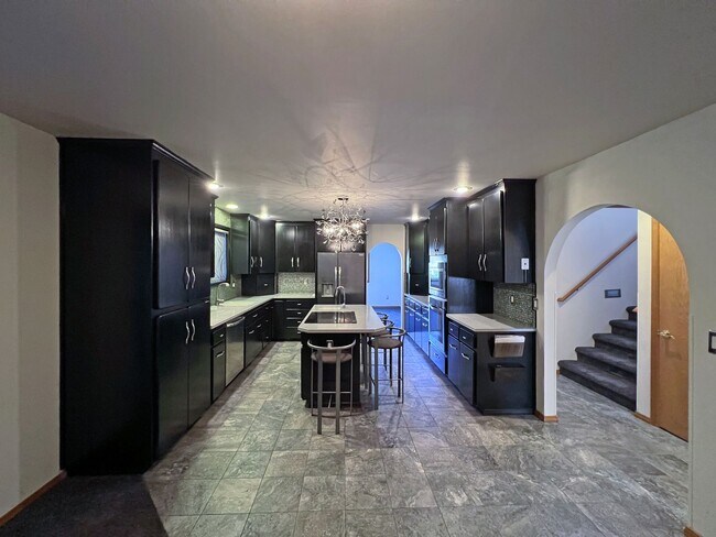 Building Photo - Stunning 4 Bedroom 2.5 Bath with Peek-a-Boo View of Puget Sound