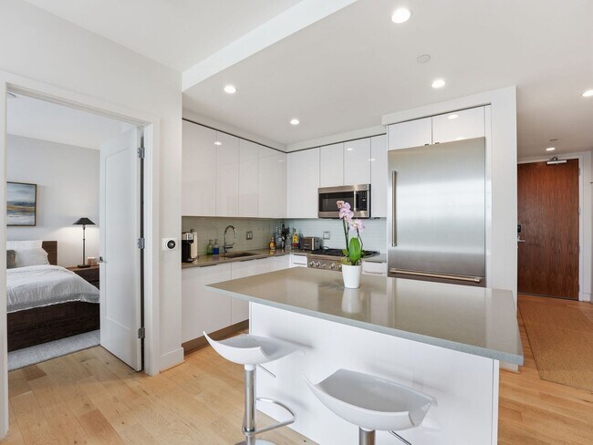 Building Photo - Designer-Furnished Waterfront Living at VIO Condominiums!