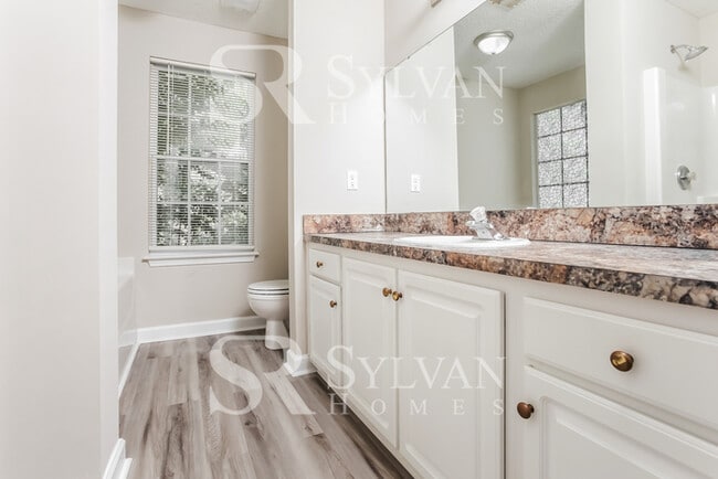 Building Photo - Welcome to this beautiful and sun-filled 3...