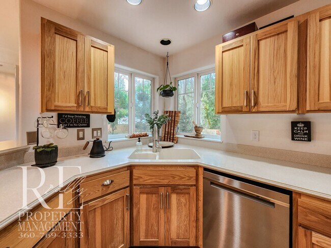 Building Photo - Light-Filled View Home with Vaulted Ceilings & Warm Wood Finishes
