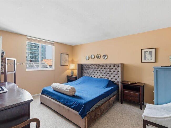 Building Photo - 3588 Collins Ave