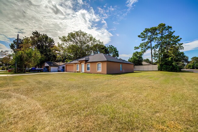 Building Photo - 4-bedroom, 2-bathroom POOL home