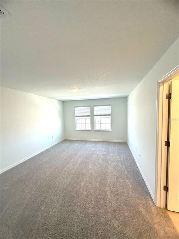 Building Photo - 8795 Coqui Song Ln