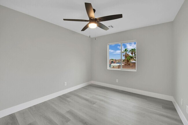 Building Photo - Charming Two-Story Townhome in a Gated Com...